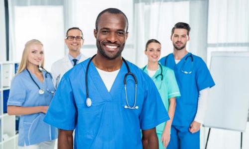 CVT to RN Online Students in Scrubs Smiling 